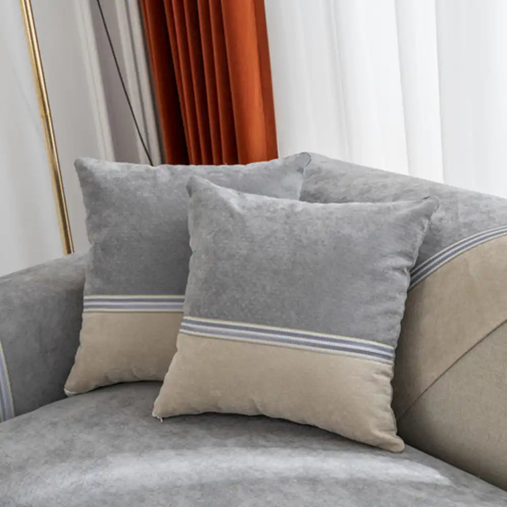 Detailed corner of a sectional covered with an all-season water-resistant colorblock protector.