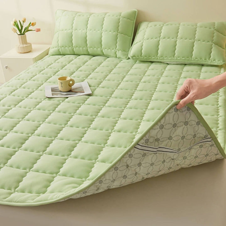 Close-up of quilted pattern on breathable mattress topper, showing soft texture and quality stitching