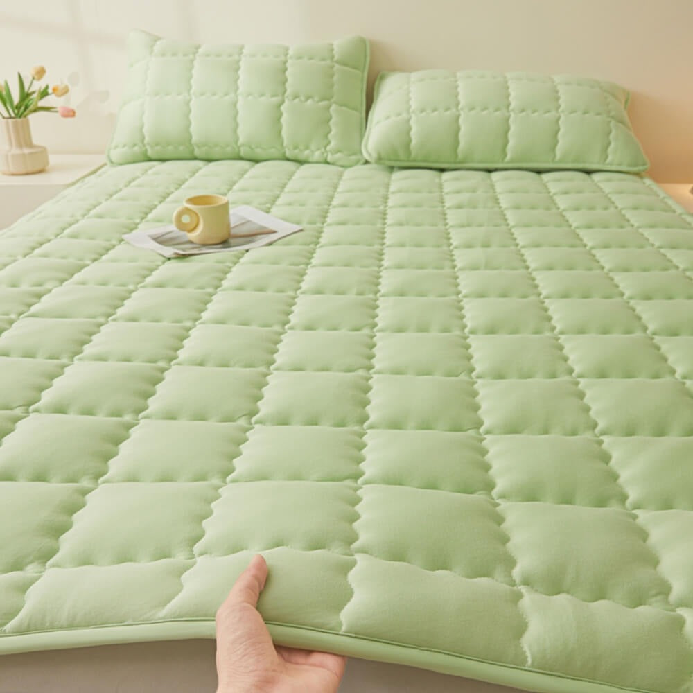 Detail of the non-slip bottom of the all-seasons mattress topper, showcasing its secure fit feature