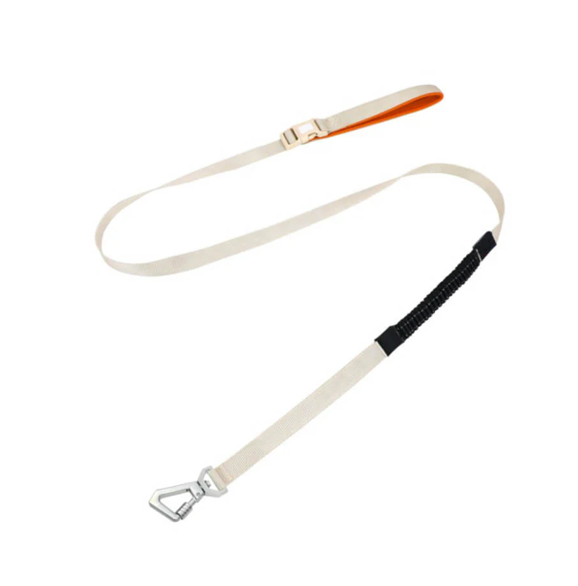 Close-up of anti-pull dog harness, showing breathable fabric and metal rings