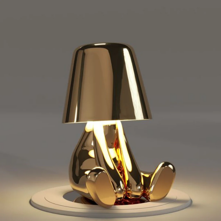 Compact artistic table lamp, dimmable for personalized lighting experiences.