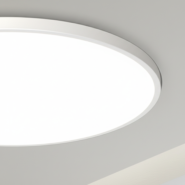 AuraSphere flat minimalist LED ceiling light enhancing bedroom comfort and modern decor.