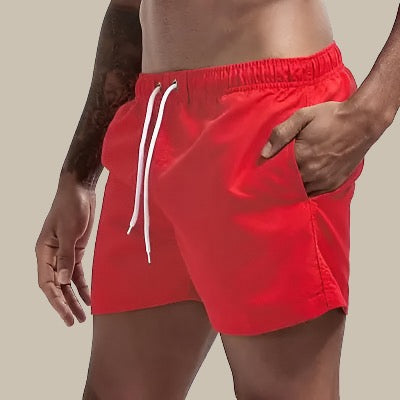 Athletic men's drawstring swim shorts, perfect for swimming and beach activities.