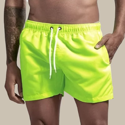 Comfortable men's swim trunks with drawstring, ideal for beach, pool, and vacation.