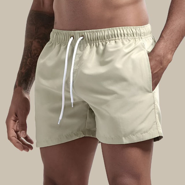 Men's quick-dry drawstring swim shorts for comfortable beachwear and summer fashion.