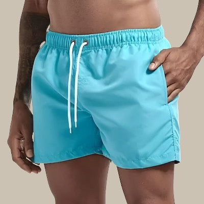Men's quick-dry beach shorts, comfortable and stylish for summer vacation wear.