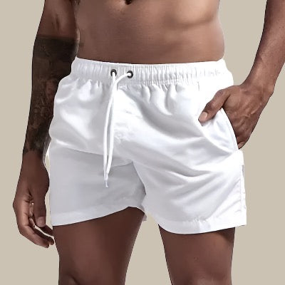 Stylish men's beachwear: quick-dry drawstring swim shorts for summer and vacations.