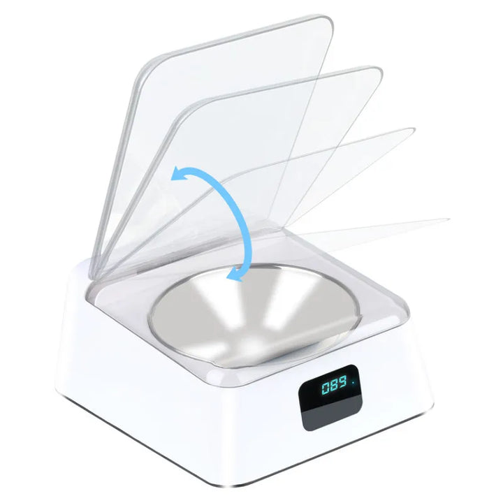 Digital automatic pet feeder showing timed meal settings, cat food dispenser