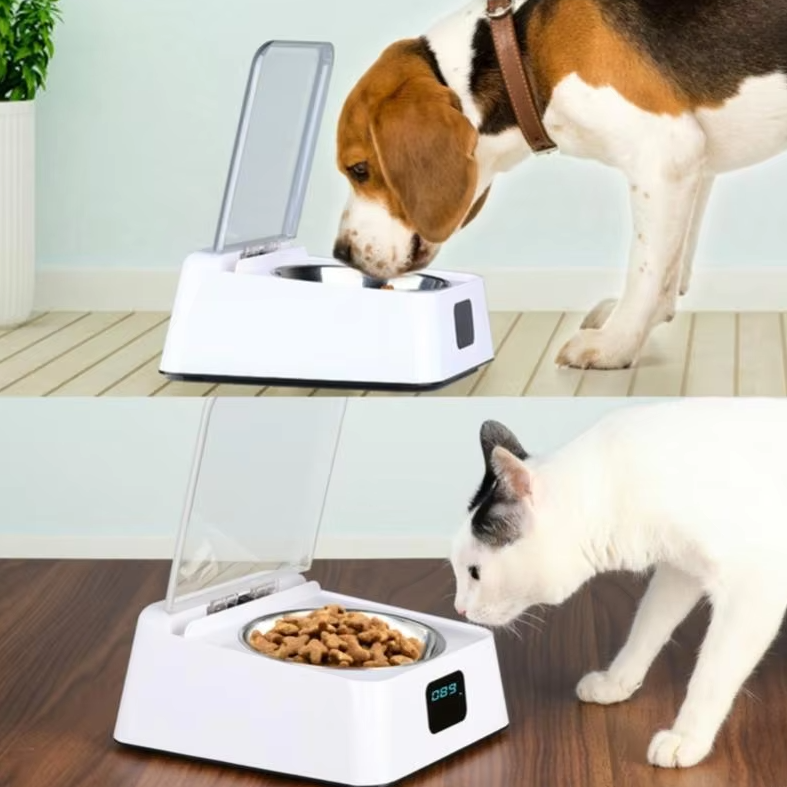 Close-up of digital display on automatic cat food dispenser, easy programming