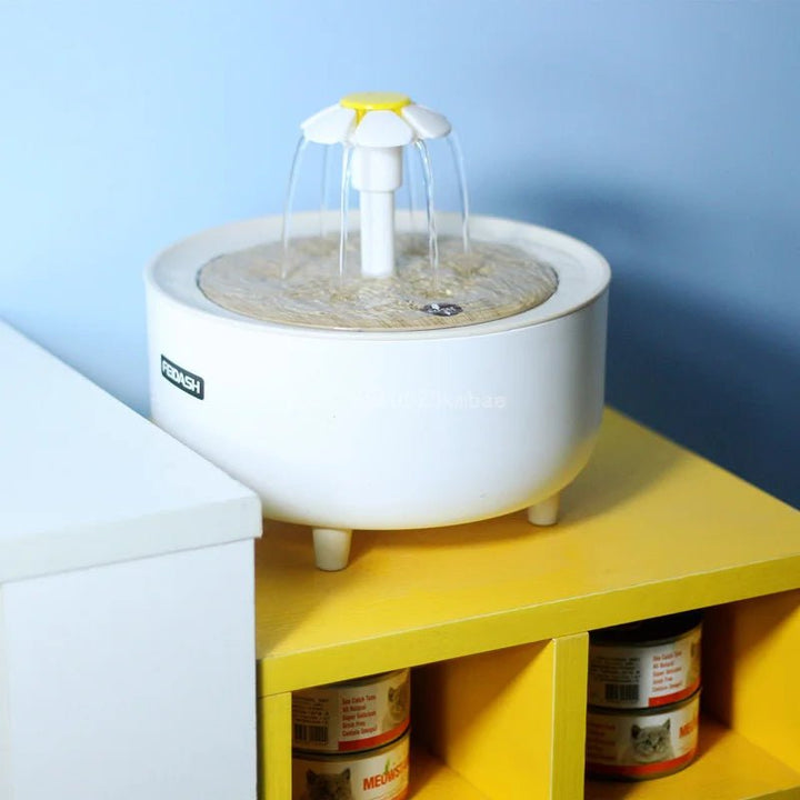 Pet drinking fountain with continuous water flow, ideal for cats and small dogs, quiet operation