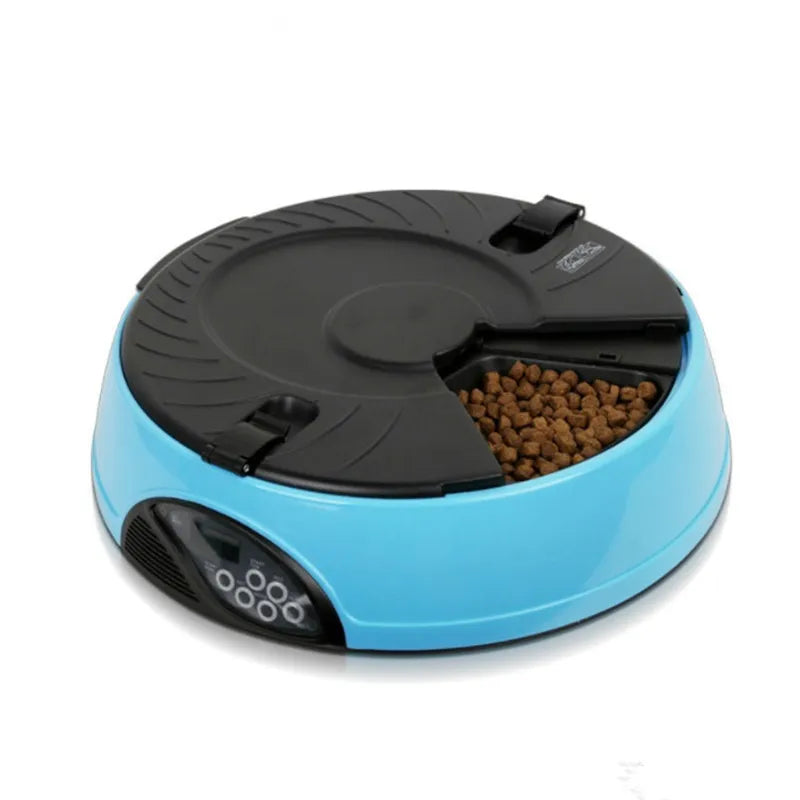 Smart pet feeder, automatic, dispenses controlled portions of dog and cat food on a timer.