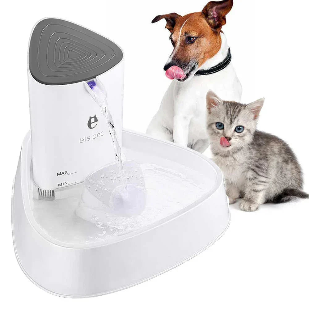 Close-up of pet water fountain, showcasing continuous flow & filtered water for healthy pets