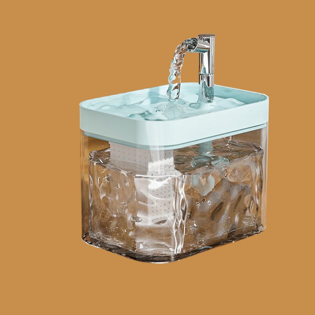 Close-up of the filtration system in an automatic pet water fountain, highlighting clean water delivery.