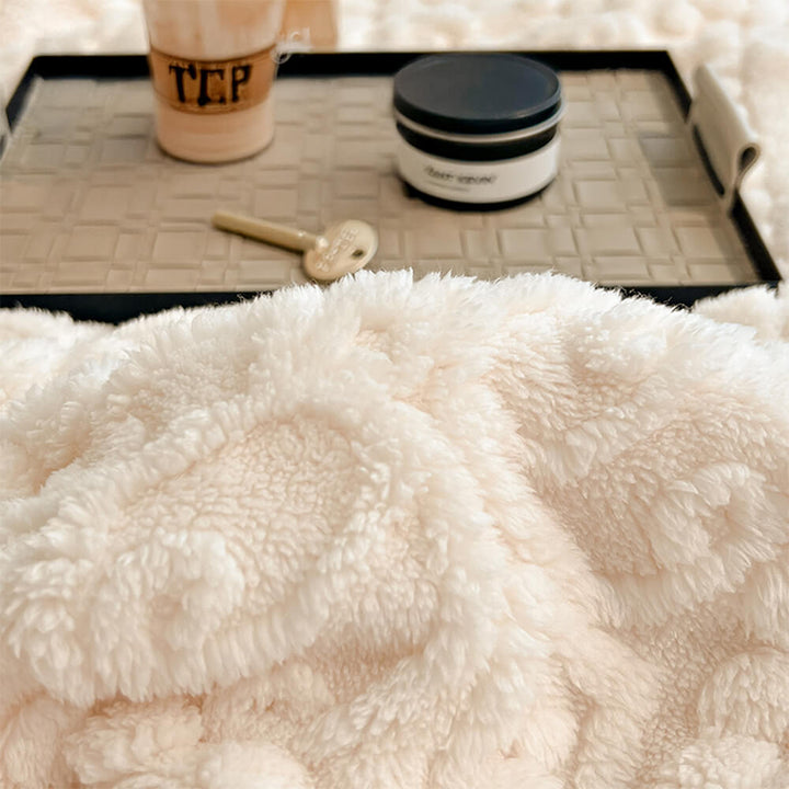 Detail of the plush milk velvet texture on a Baroque embossed fleece blanket, soft & warm