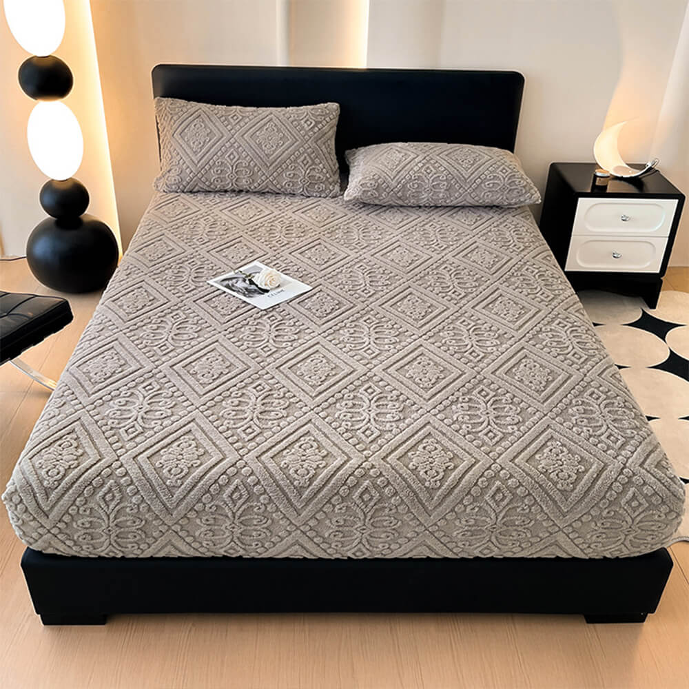 Warm milk velvet fitted sheet with intricate baroque embossing, paired with a matching pillowcase. Cozy bedding.