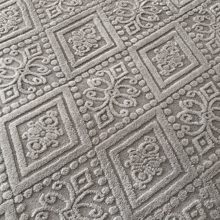 Luxurious baroque embossed fitted sheet and pillowcase in warm milk velvet. Enhance your home decor.