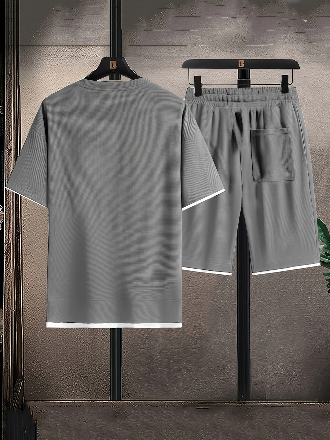 Comfortable men's 2-piece lounge set with waffle texture. Relaxed fit shorts & t-shirt for casual wear.