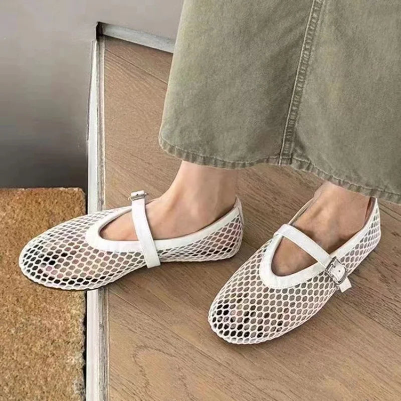 White women's mesh Mary Jane flats, comfortable and breathable, ideal for casual and travel.