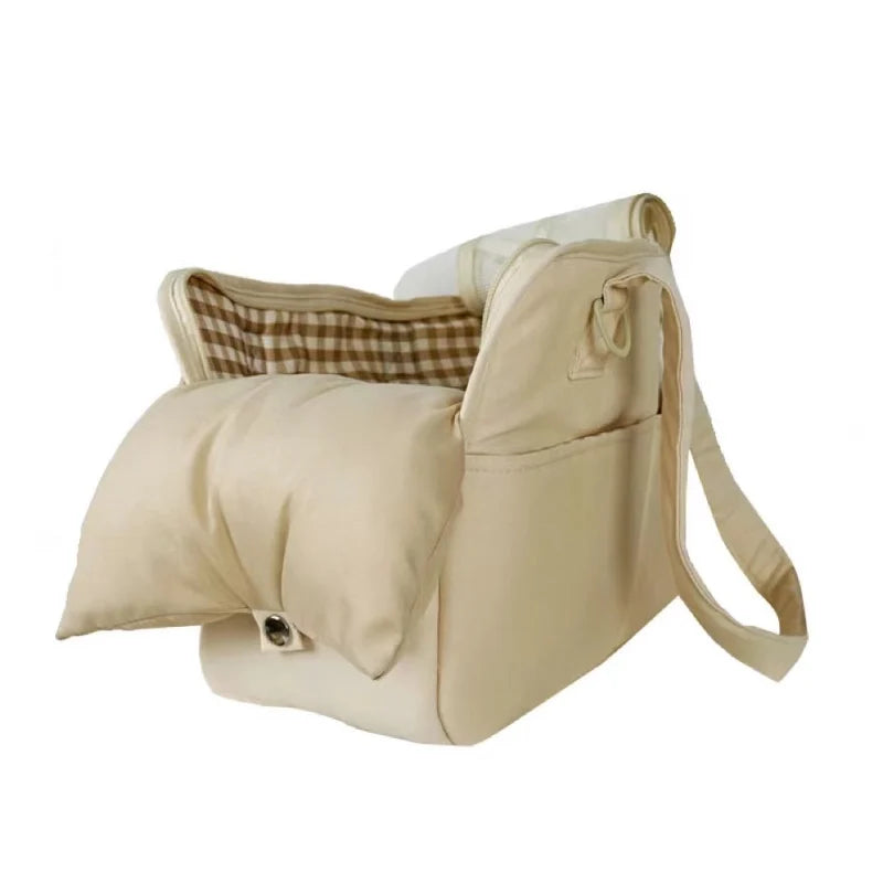 Beige lightweight breathable pet carrier for small dogs and cats, front view.