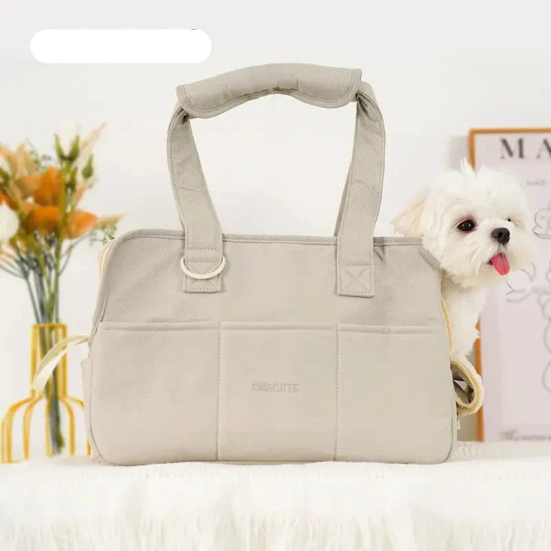 Comfortable cat carrier, beige, with a cozy interior for travel.