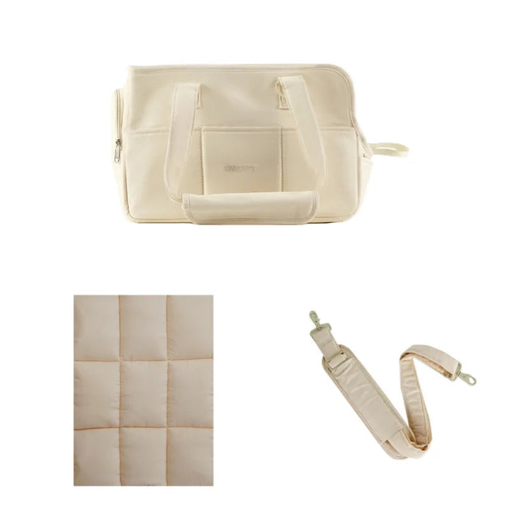 Small pet supplies: beige pet carrier for comfortable and safe travel.