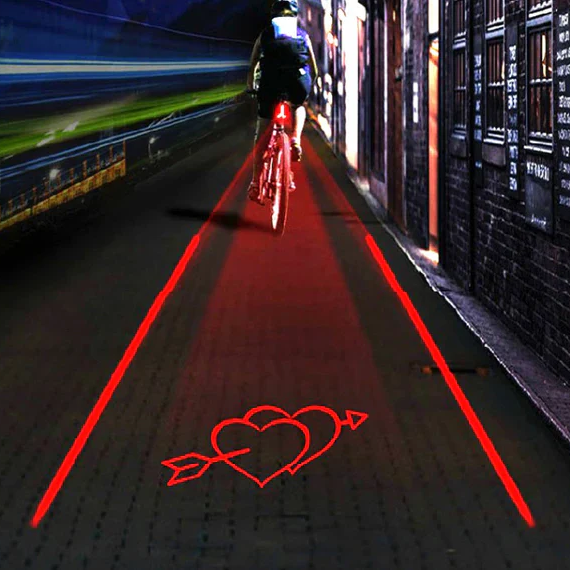 Bicycle laser rear light with LED, ensuring enhanced night safety for cyclists. Rechargeable bike gear.