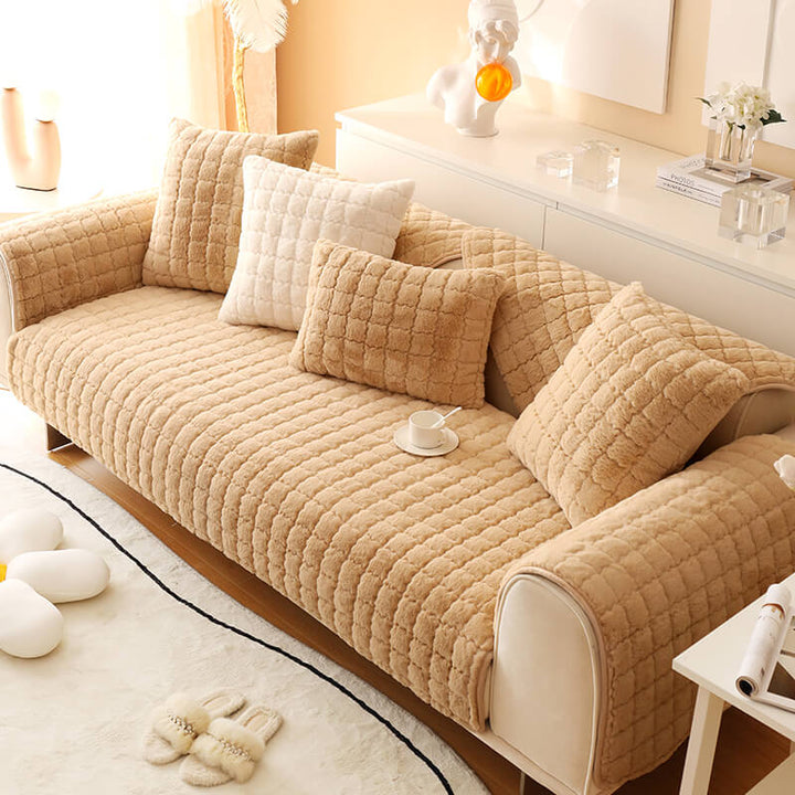 Pet sleeping soundly on the soft biscuit plush non-slip couch cover, easy to clean