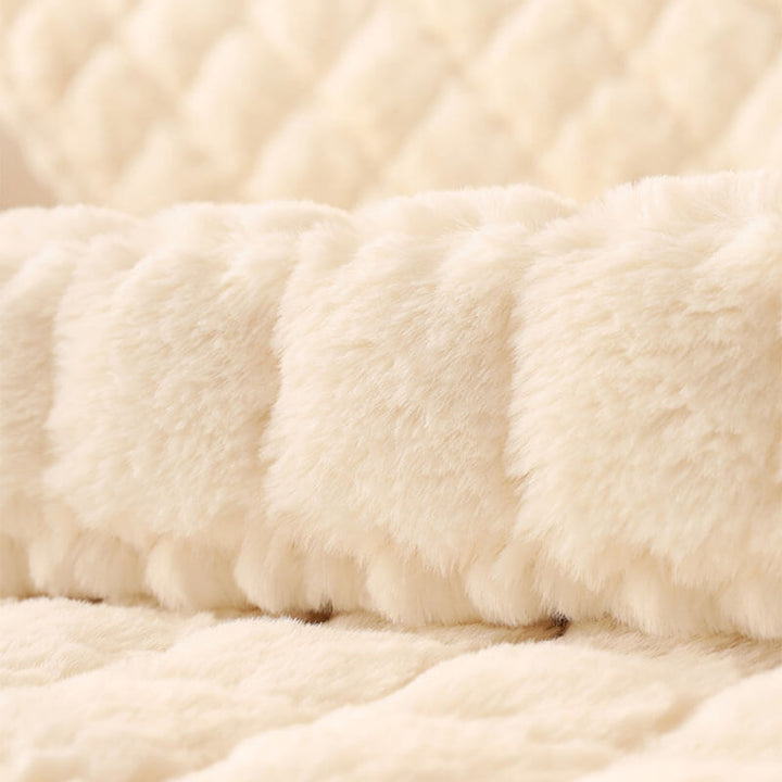 Biscuit plush non-slip sofa protector covering a corner sectional, elegant home decor