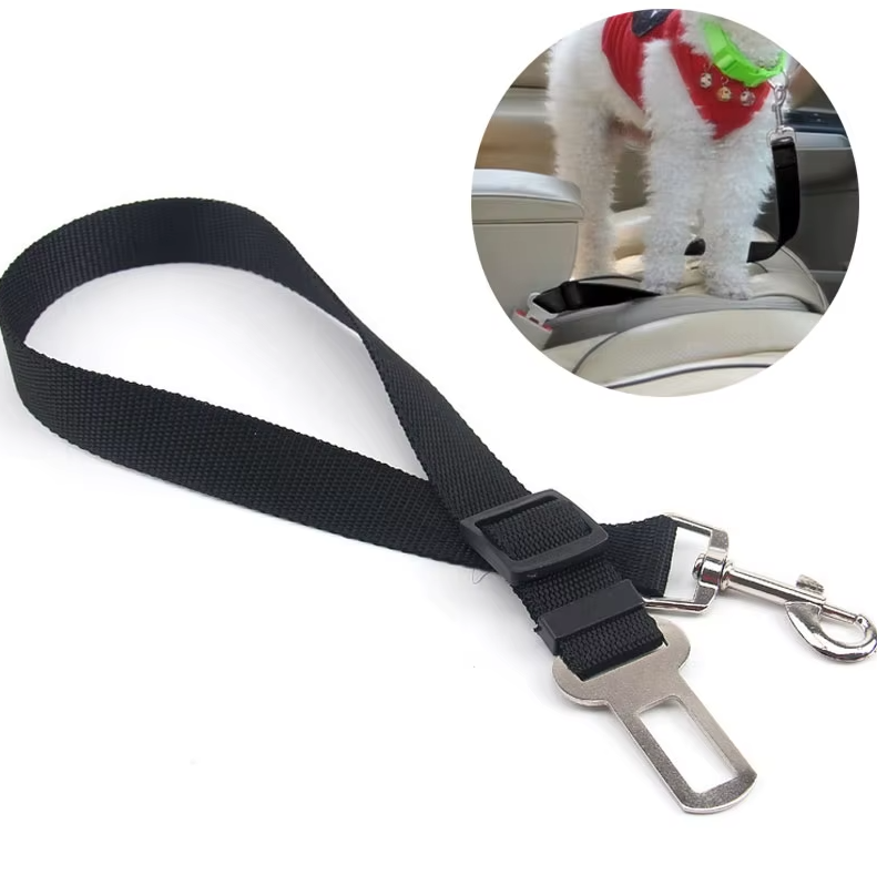 Black adjustable car safety belt for dogs with a carabiner, securely attached to a car's seatbelt.