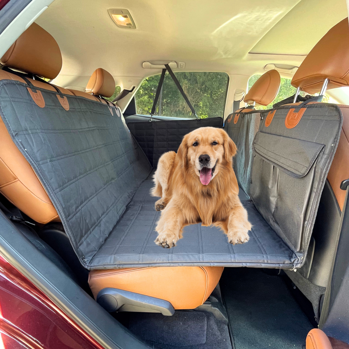 Comprehensive car interior protection: black dog backseat extender, vehicle pet mat, and door covers for pet travel.