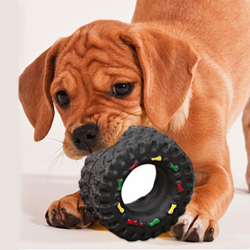 Black dog tire chew toy with dental texture for pet teeth cleaning and interactive play