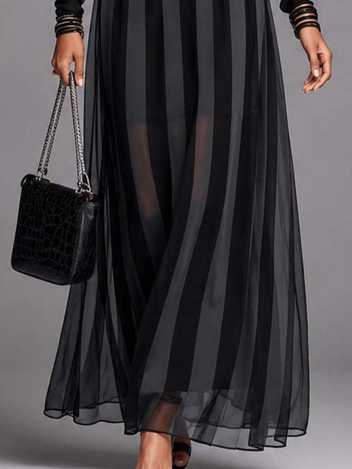 Stylish women's black maxi dress with sheer striped long sleeves, ideal for elegant evening wear or a formal event.