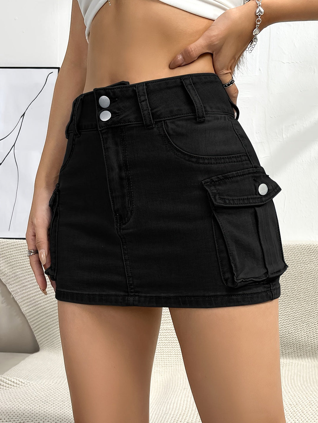 Black high waist cargo mini skirt for women, perfect for trendy street style fashion.