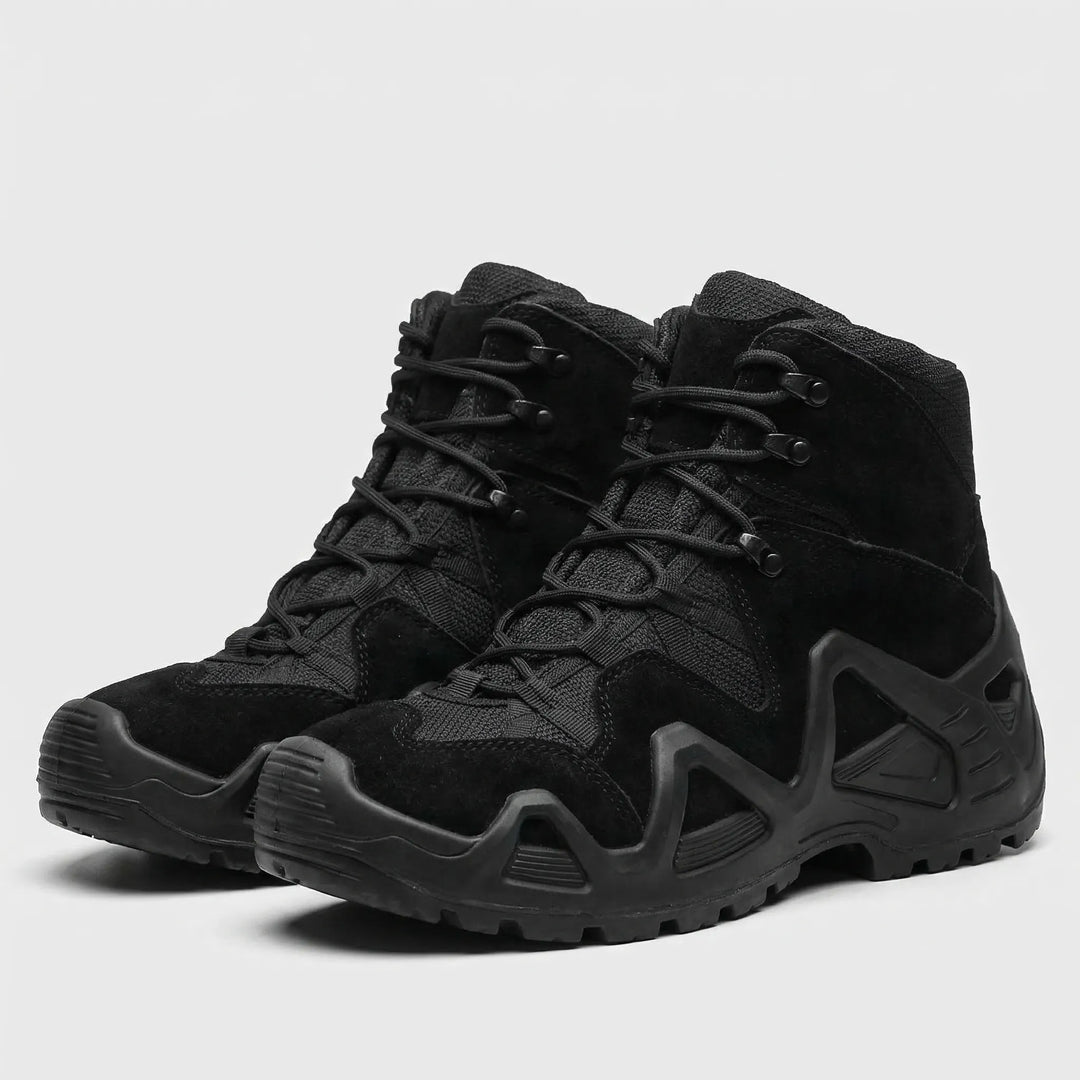 Men's all-terrain hiking boots, black lace-up design, perfect for outdoor trails and tough conditions.