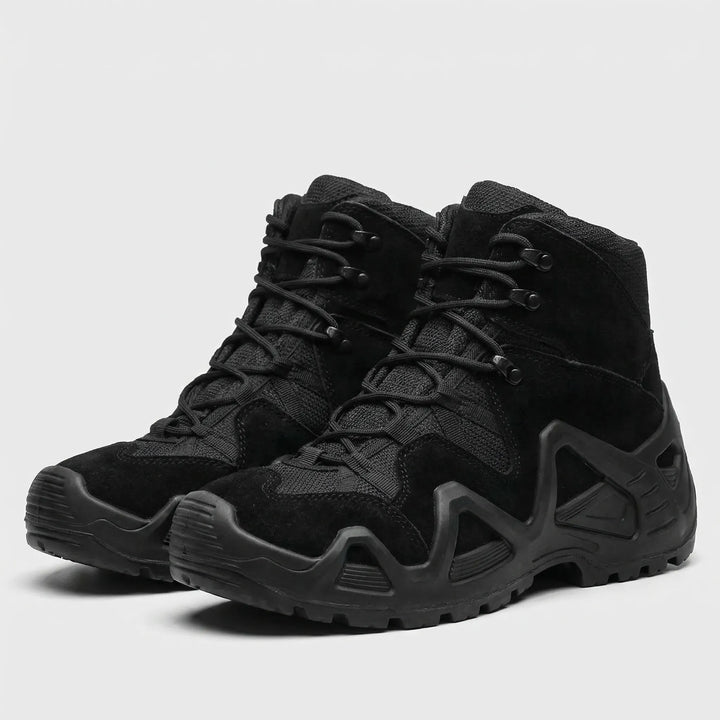 Men's all-terrain hiking boots, black lace-up design, perfect for outdoor trails and tough conditions.