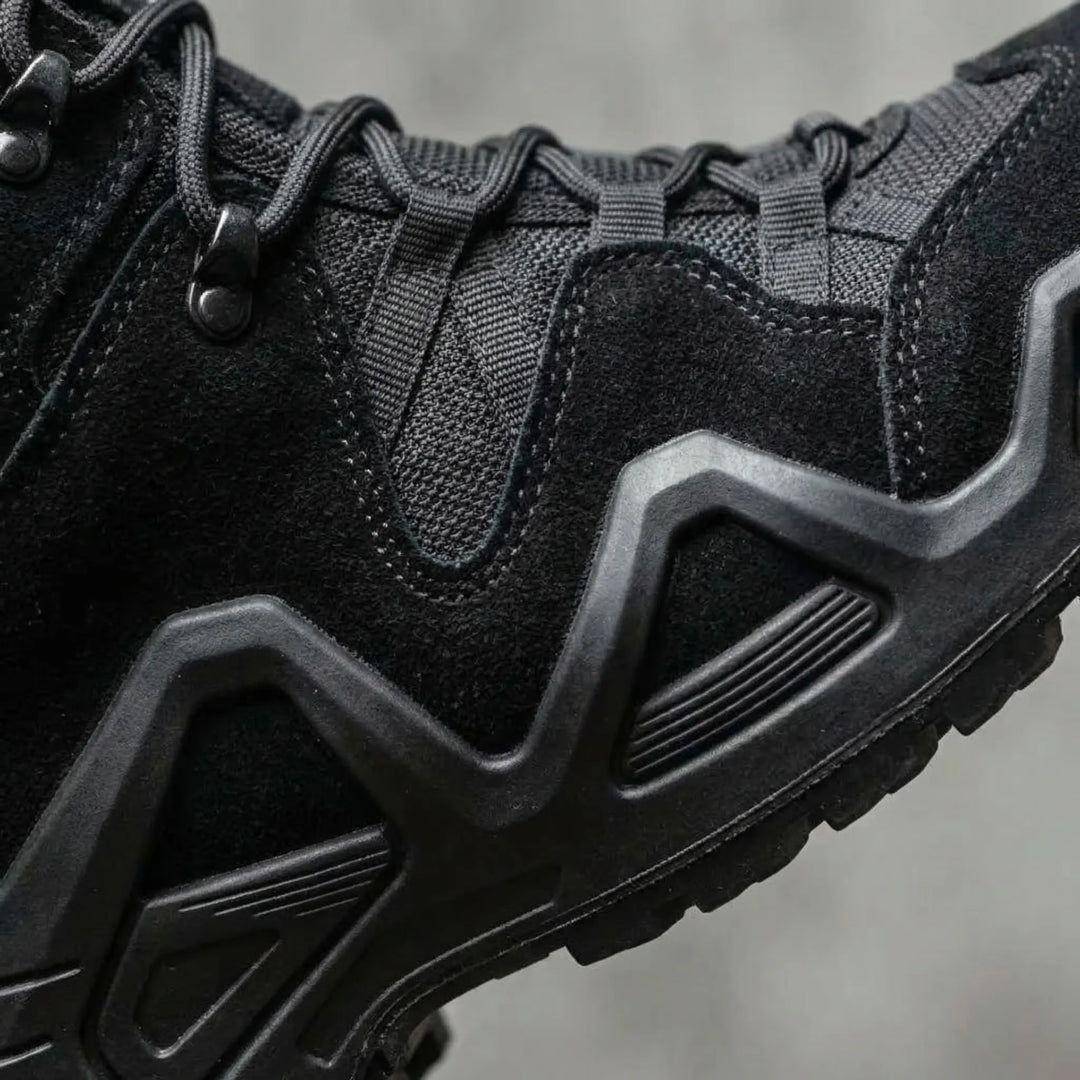 Durable black men's work boots, tactical design with ankle support for demanding jobs and outdoor use.