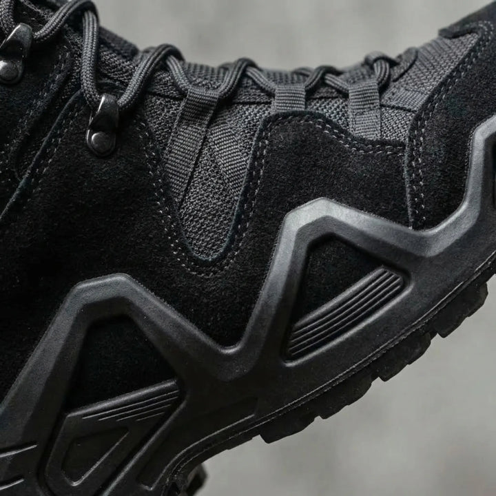 Durable black men's work boots, tactical design with ankle support for demanding jobs and outdoor use.