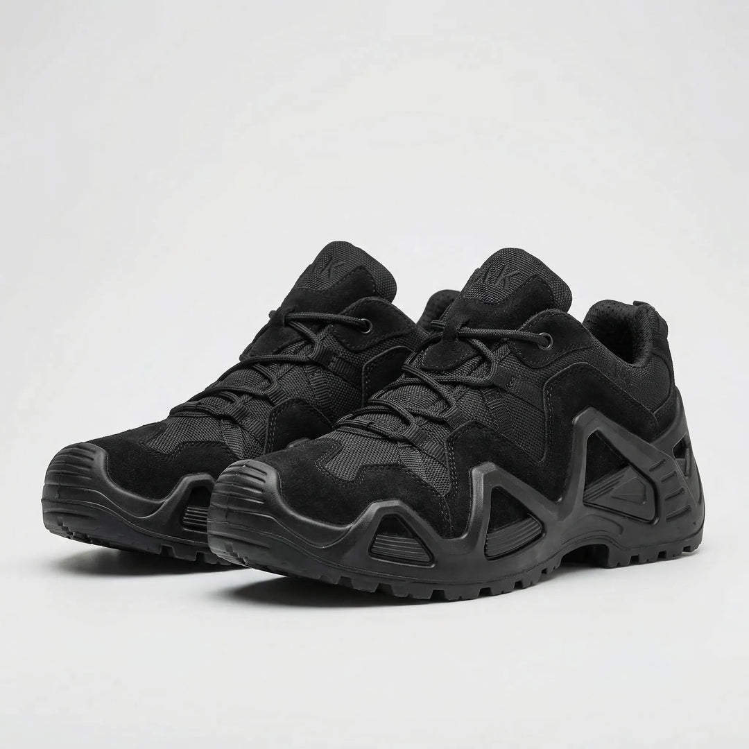 Side view of black men's durable tactical boots, showcasing ankle support and heavy-duty construction.