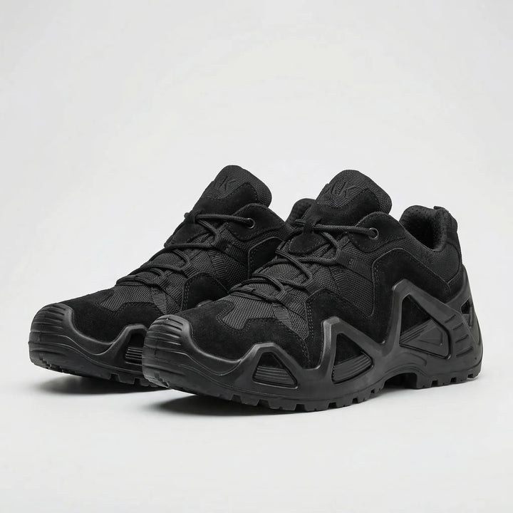 Side view of black men's durable tactical boots, showcasing ankle support and heavy-duty construction.