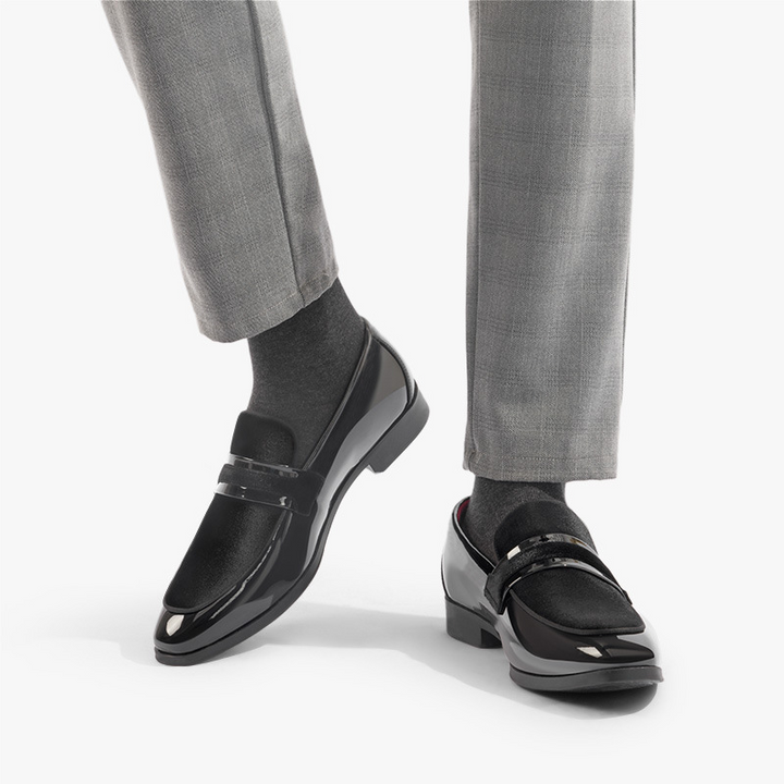 Navy blue men's dress loafers with a polished finish. Ideal formal footwear for special events.