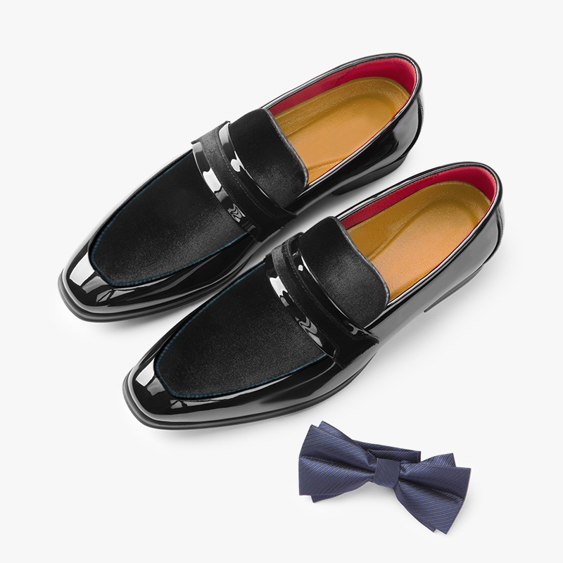 Side view of a men's black formal loafer, highlighting the sleek silhouette & comfortable slip-on fit.
