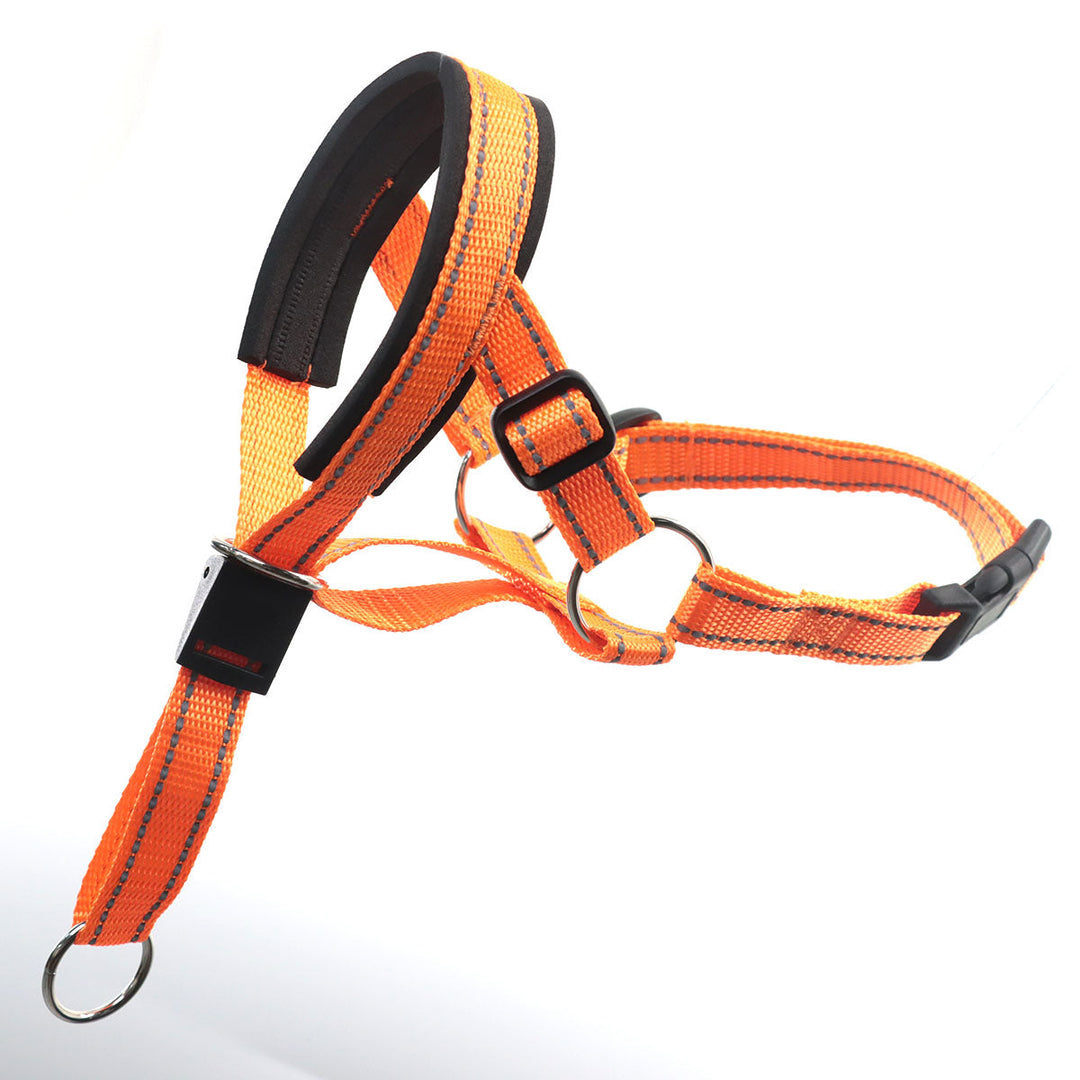 Black nylon dog muzzle with reflective strips, for anti-bark training and safe walks.