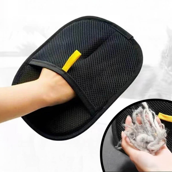 Black pet hair removal glove with red bristles for grooming dogs & cats, reusable