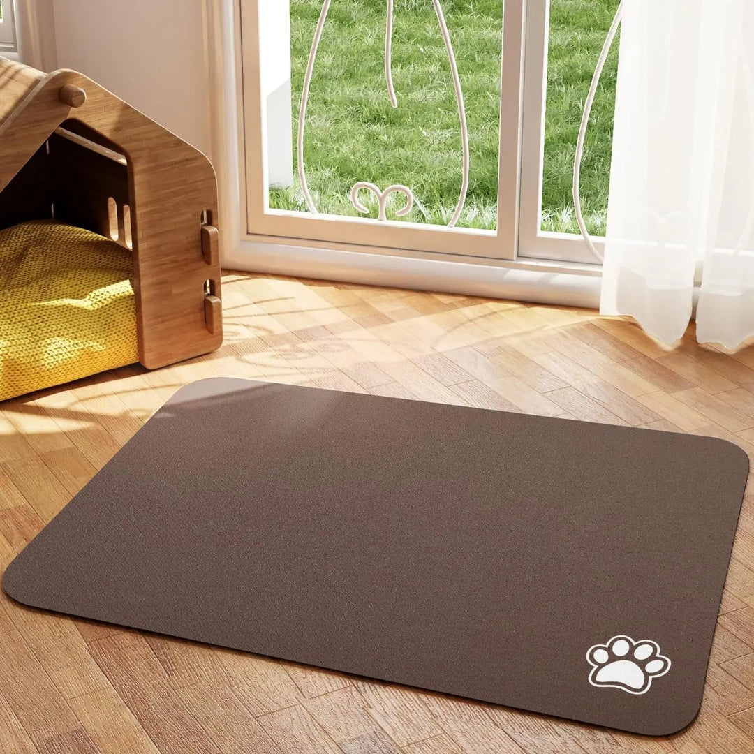 Top-down view of a rectangular absorbent non-slip pet bowl mat, clean and empty