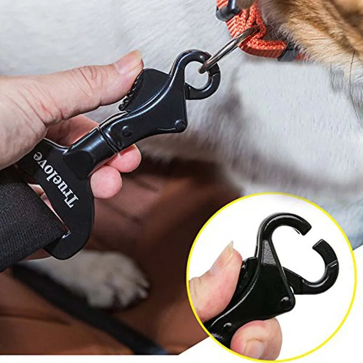 Black unisex dog car seat belt clip for secure pet restraint and vehicle safety during travel