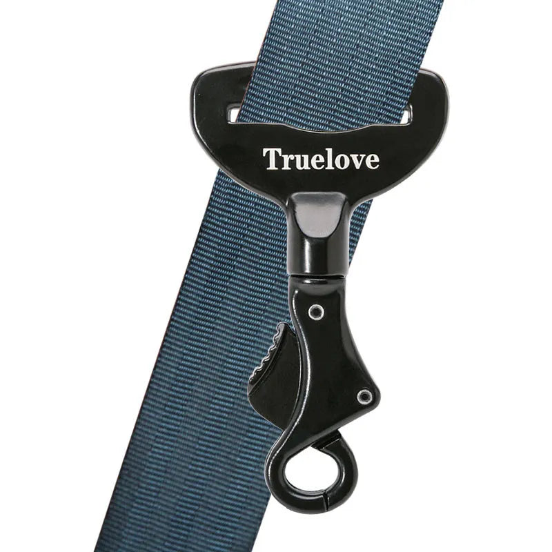 Close-up of black dog car seat belt clip, an essential pet safety travel accessory