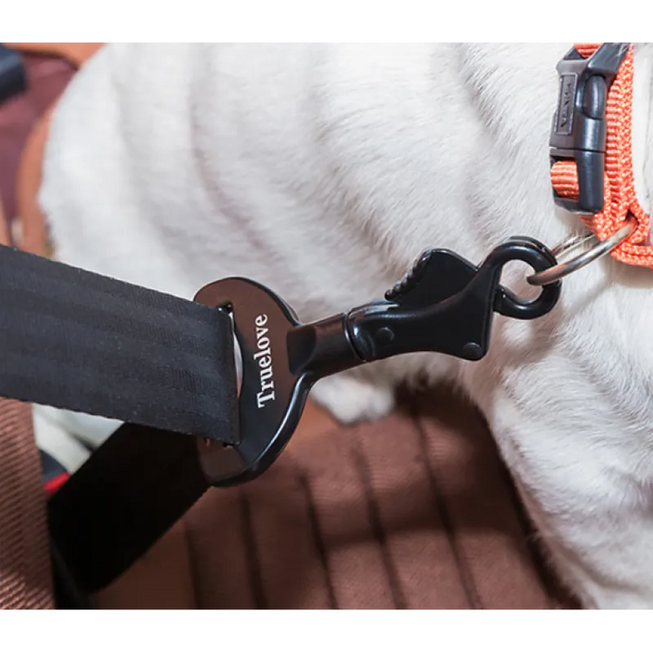 Secure dog gear: black car seat belt clip for pet travel and vehicle safety