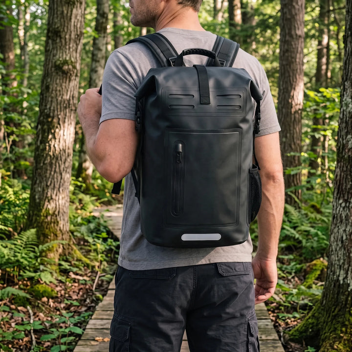 Black waterproof roll-top backpack for outdoor adventures, camping, and hiking.