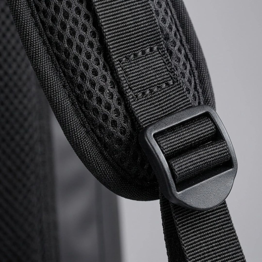 Adventure-ready black waterproof roll-top daypack for hiking, travel, & outdoors.