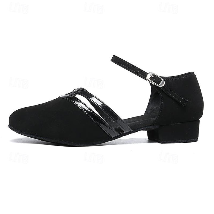 Stylish black women's ankle strap dance shoes offering a secure fit for all performance and dancewear needs.